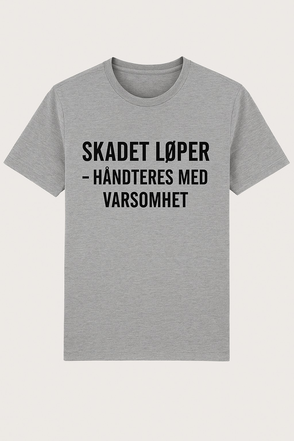 T-skjorte med teksten "Skadet løper - håndteres med varsomhet"